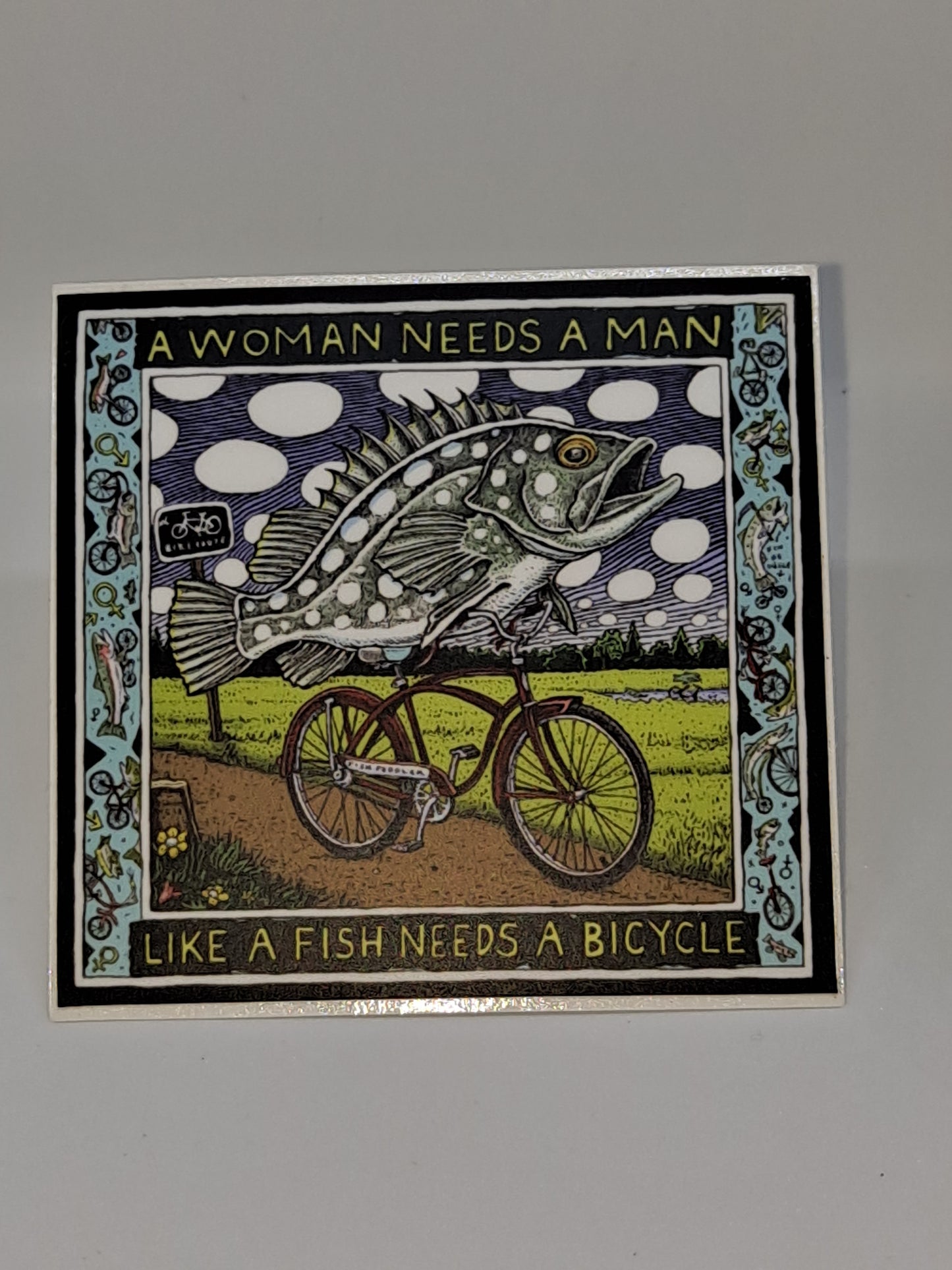 A Woman Needs A Man Like A Fish Needs A Bicycle Sticker